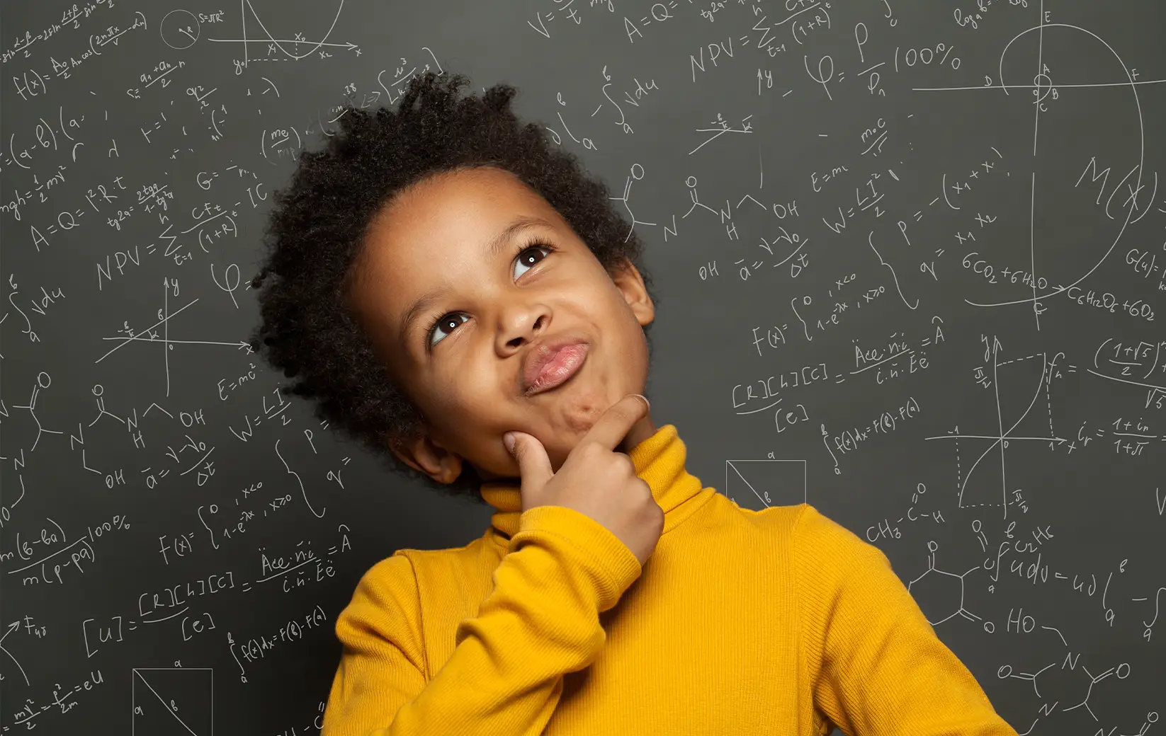 Child pondering in front of a blackboard filled with equations