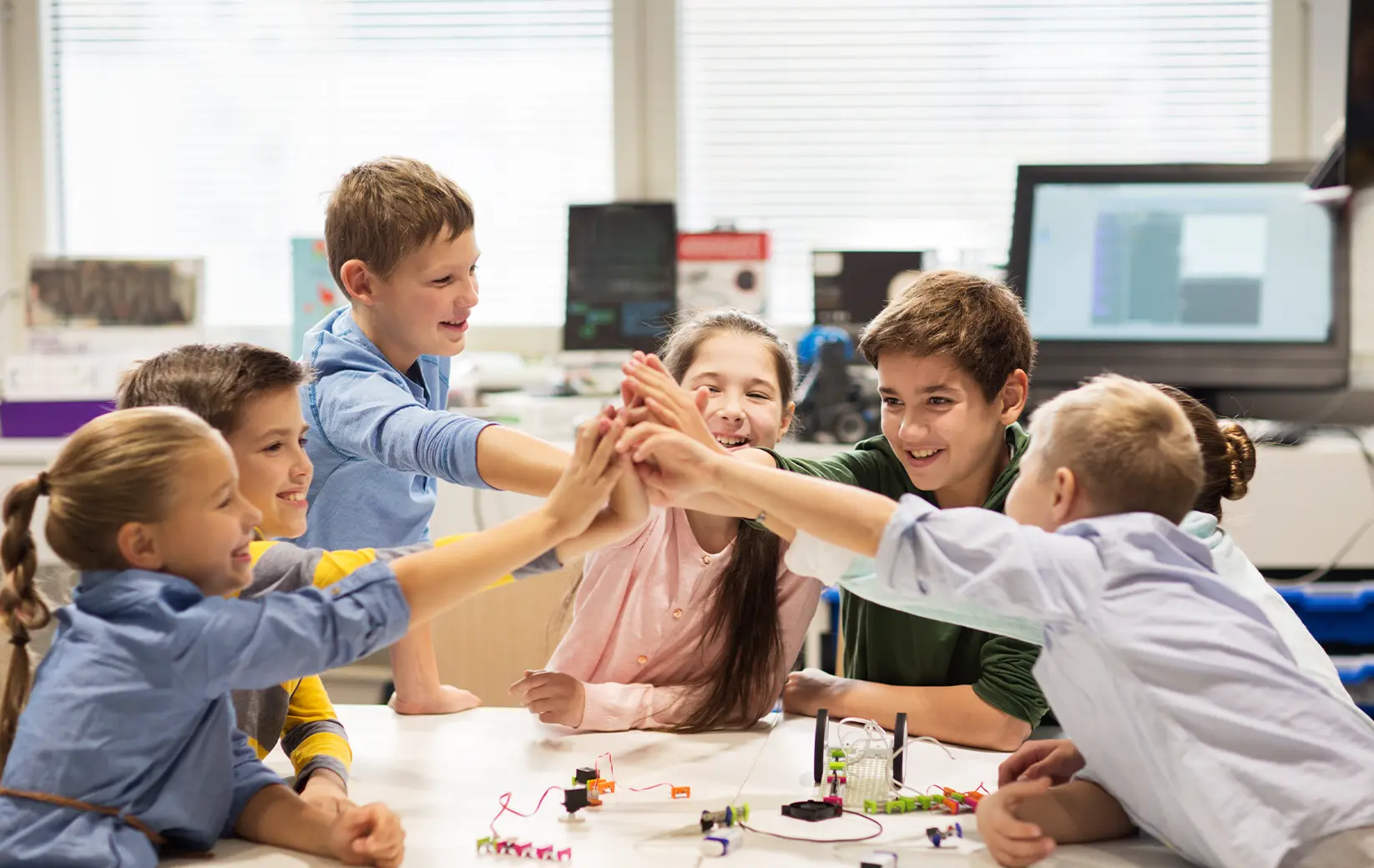 Children collaborating in a classroom during a group project